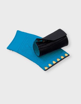 A blue and black cotton wristband/hand guard with six gold clasps, shown flat with one end partially rolled.