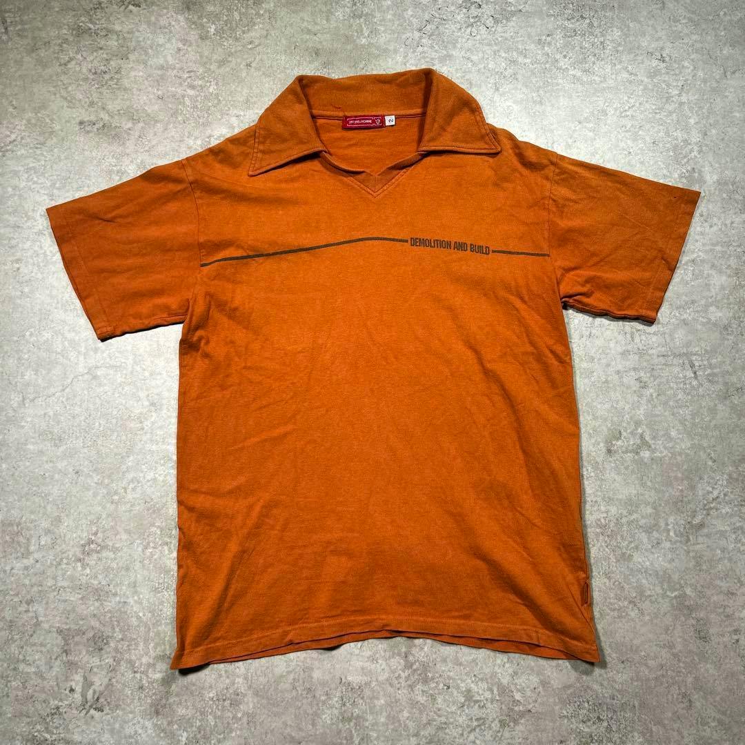 Orange skipper-style short-sleeve t-shirt laid flat showing the front.