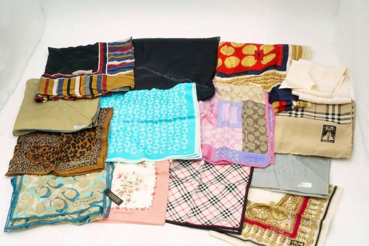 A set of 13 silk handkerchiefs and scarves from assorted brands arranged on a white background.