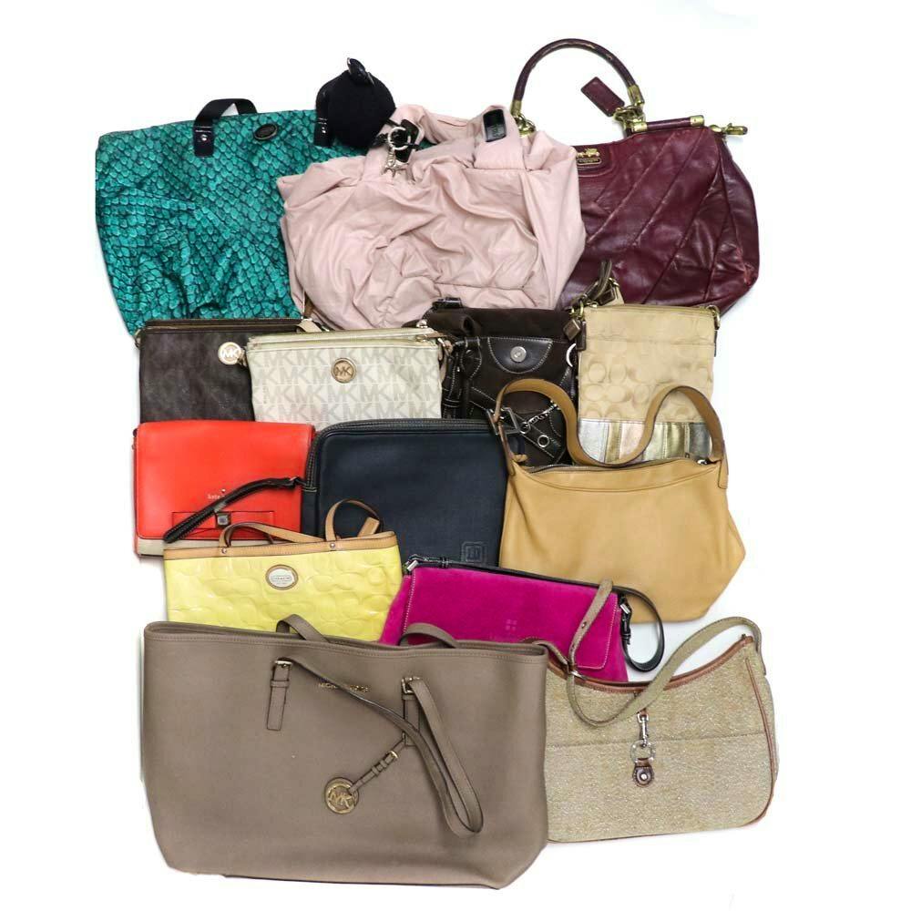 Multiple handbags of different sizes and colors arranged together on a white background.
