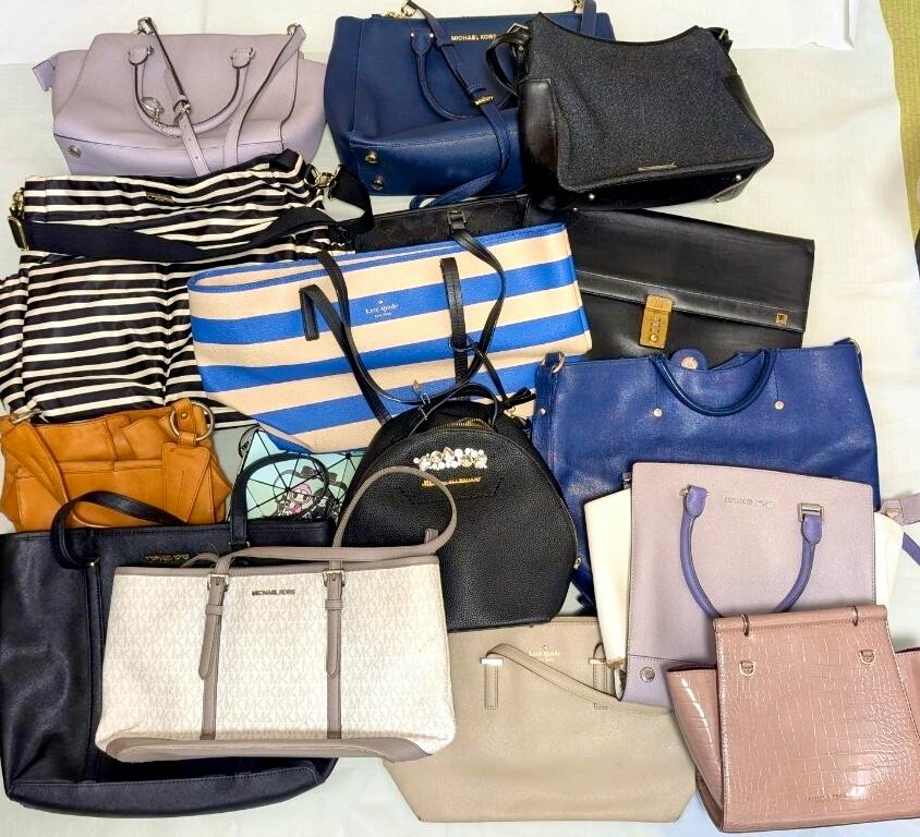 A spread of multiple assorted handbags from the listed brands laid out on a flat white surface.