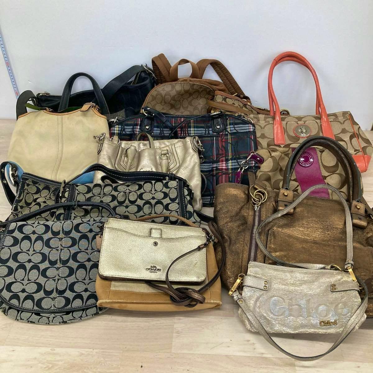 A grouped set of assorted women's handbags and shoulder bags displayed together as a bulk set.