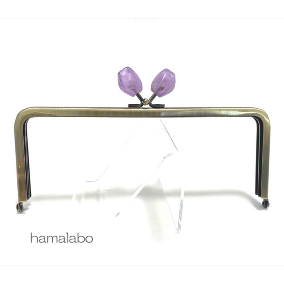 Antique-gold 18cm square purse frame with two purple stone-style clasp beads displayed on a clear stand.