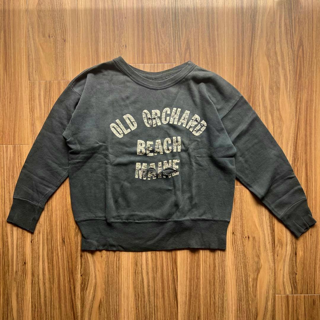 Black vintage sweatshirt laid flat showing front printed text that reads "OLD ORCHARD BEACH MAINE".