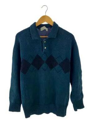 Green cotton argyle knit sweater with a buttoned collar hanging on a wooden hanger.