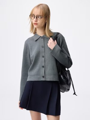 Model wearing the 2-piece rib knit polo shirt set against a white background.