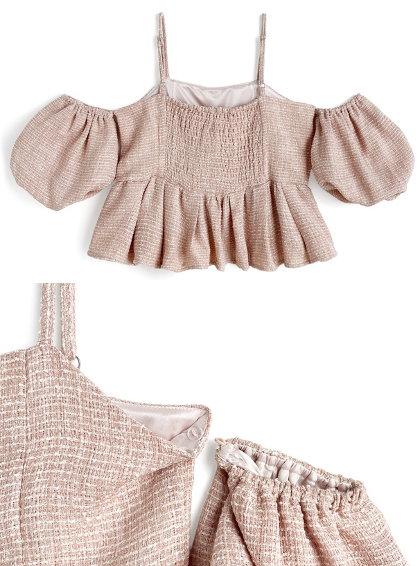 Front view of a pink tweed peplum women's blouse with thin straps and puff sleeves, with a fabric close-up and an elastic sleeve piece visible.