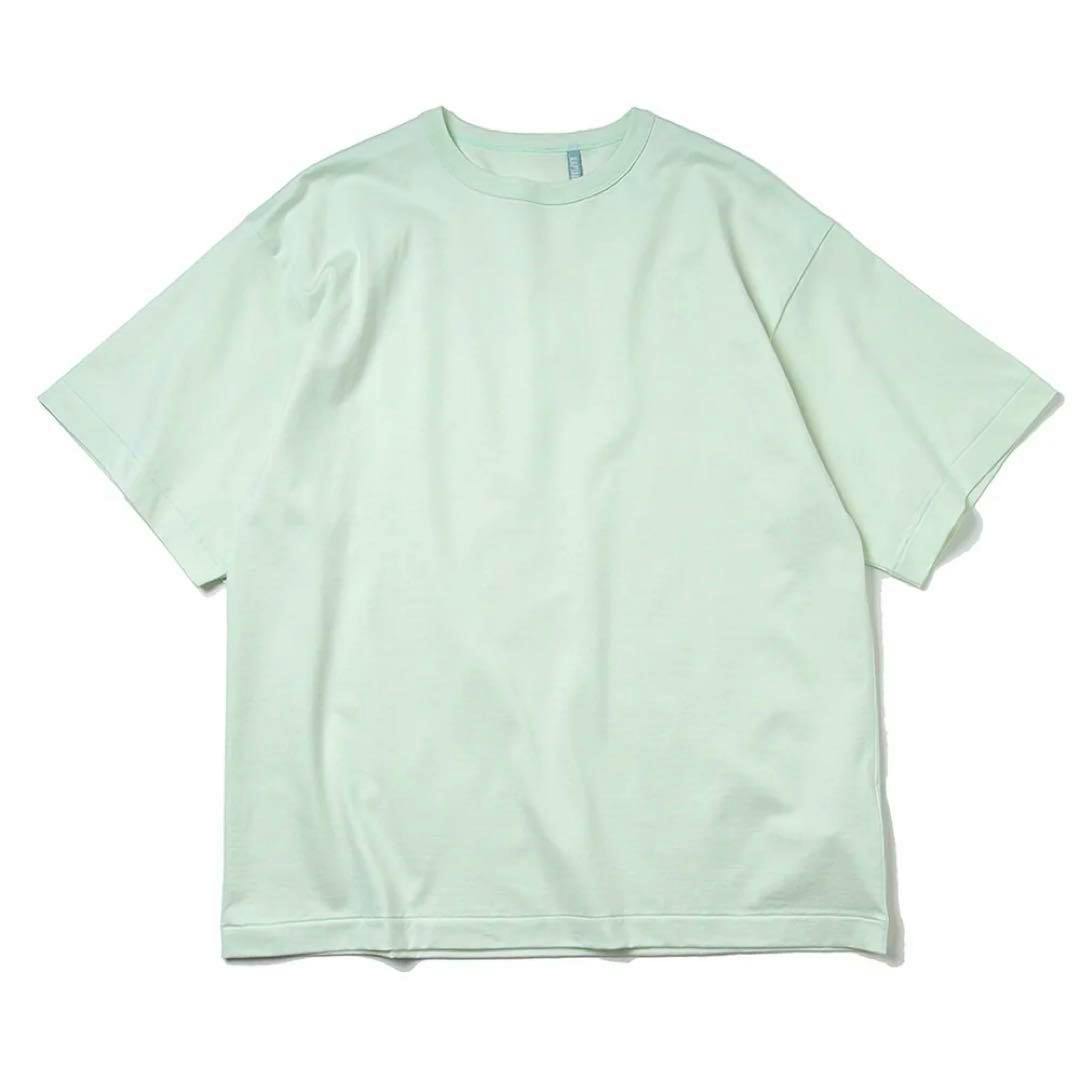 Flat lay of a light mint cotton T-shirt shown on a white background.