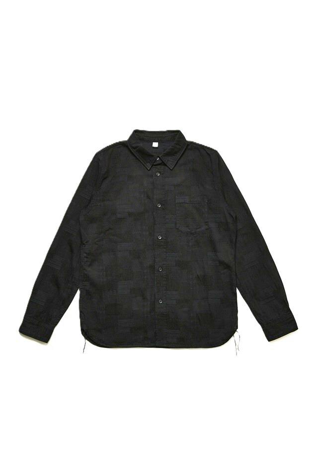 Front view of the men's double black jacquard patchwork cotton shirt laid flat showing buttons and a chest pocket.