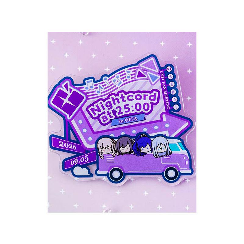 Photo of the purple acrylic badge showing four chibi characters in a bus beneath a sign reading "Nightcord at 25:00."