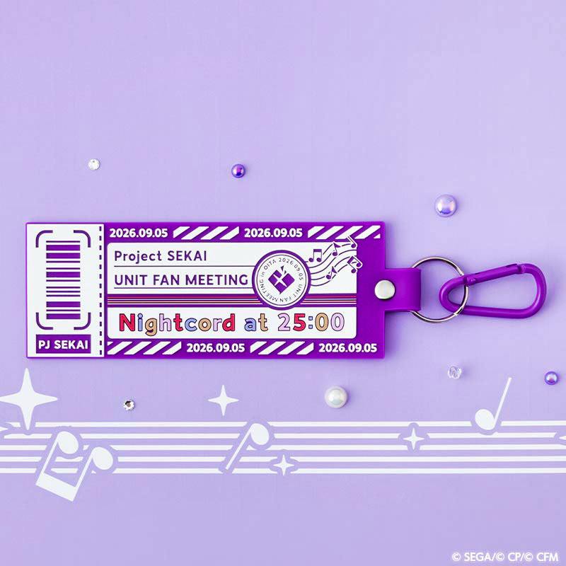 Photo of the rubber keychain with a purple ticket-style design reading "Nightcord at 25:00" and a purple carabiner on a lavender background.