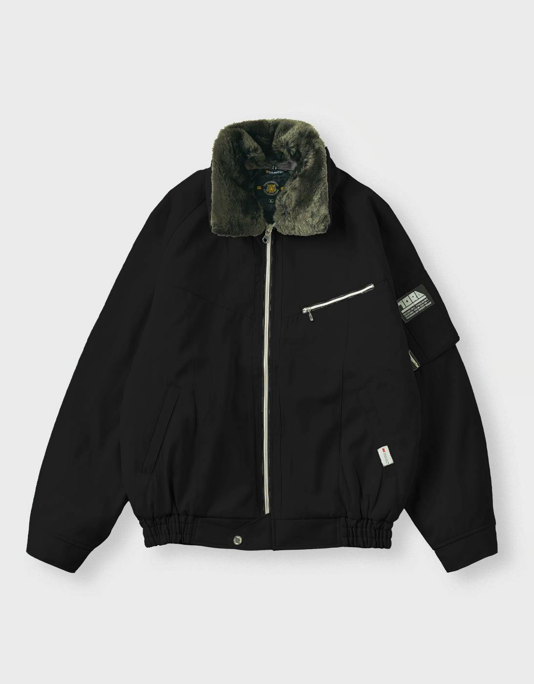 Black men's pilot jumper jacket with a green faux-fur collar, central zipper, and a zippered chest pocket.