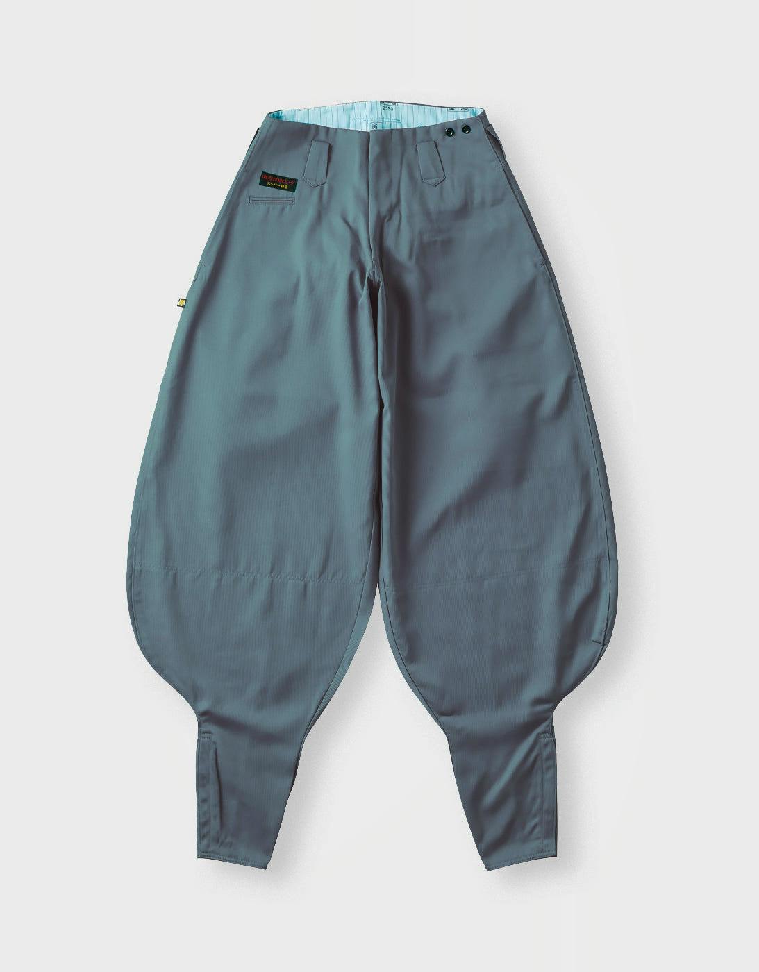 A pair of gray men's polyester pants with an extremely wide, rounded silhouette laid flat on a white background.