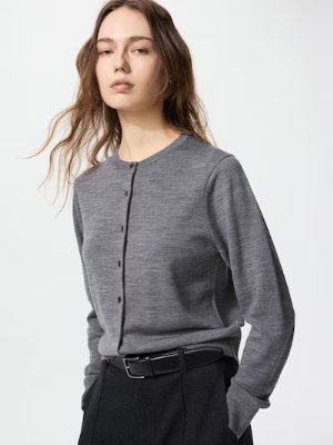 Model wearing a grey 3D merino rib crew-neck sweater with elbow-length sleeves.