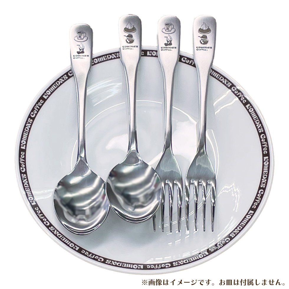Four stainless steel cutlery pieces (two spoons and two forks) arranged on a round plate.