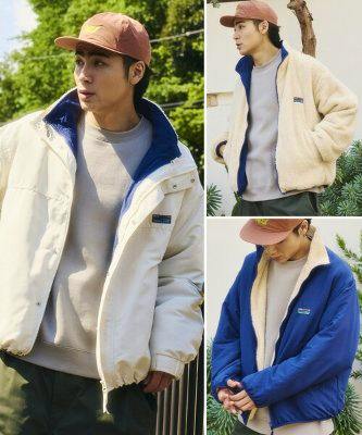 Model wearing a reversible nylon-fleece liner blouson shown in cream and blue in three poses.