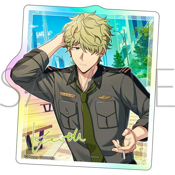 Paper sticker artwork showing a blond male anime character in a dark green military-style shirt and tie, holding a cigarette in an outdoor park setting.