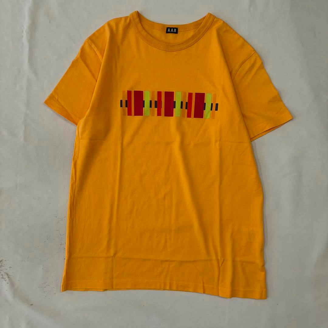 Yellow men's cotton T-shirt laid flat showing a multicolored rectangular chest graphic and an A.A.R neck label.