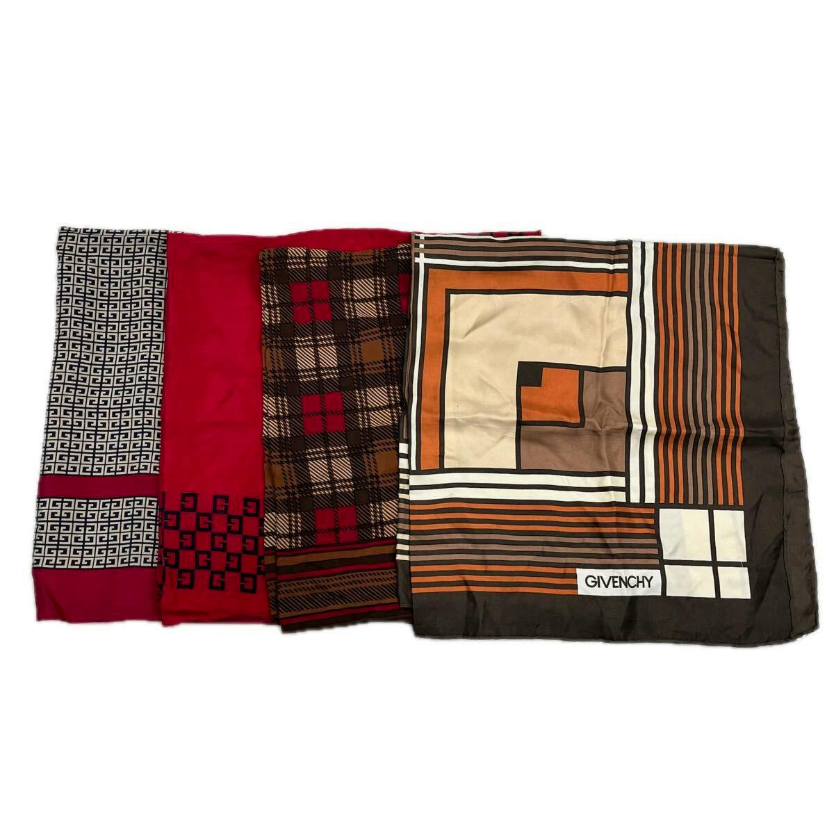 Four Givenchy silk scarves/handkerchiefs laid flat showing various geometric, check and 4G patterns, one with a GIVENCHY logo.