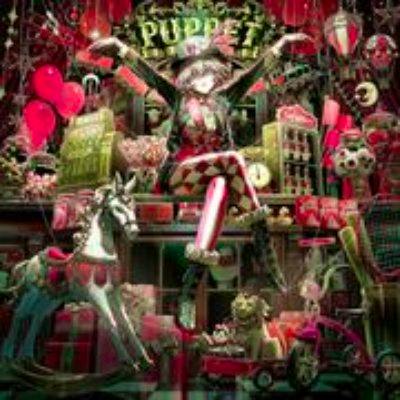 CD cover artwork for 9Lana's 1st album "Puppet" showing an illustrated puppet-themed scene.