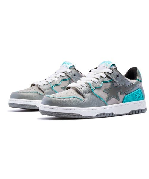 Gray and teal BAPE SK8 STA sneakers shown from a front three-quarter view on a white background.