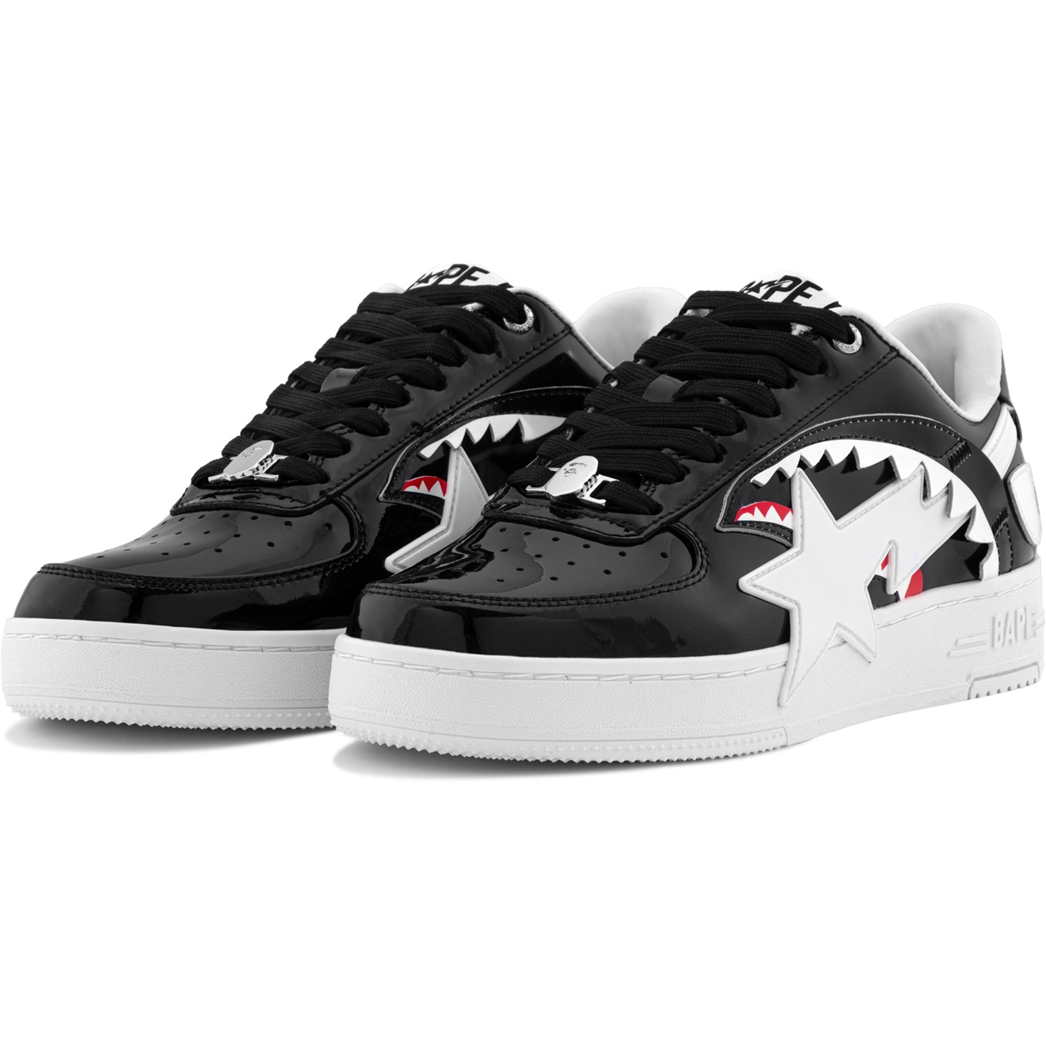 Pair of black BAPE STA OS #1 men's leather sneakers shown with the shark-mouth and star side design on a white background.