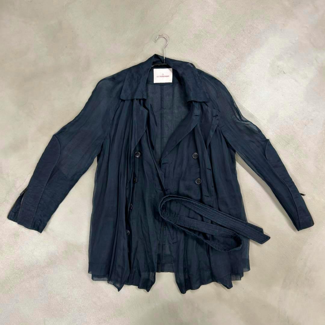 Sheer tailored women's jacket laid flat on a light background showing the front, sleeves, buttons, and matching belt.