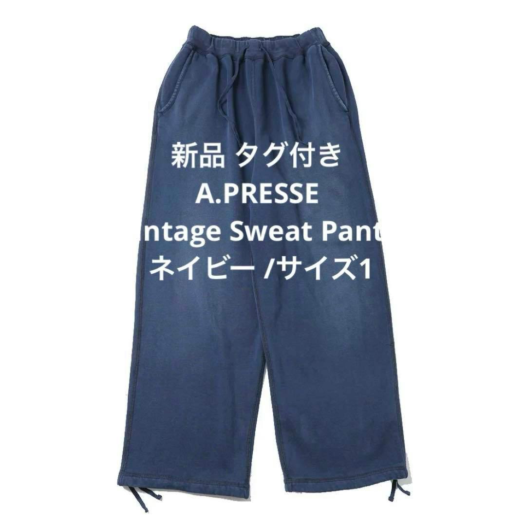 Navy A.PRESSE vintage sweat pants laid flat on a white background.
