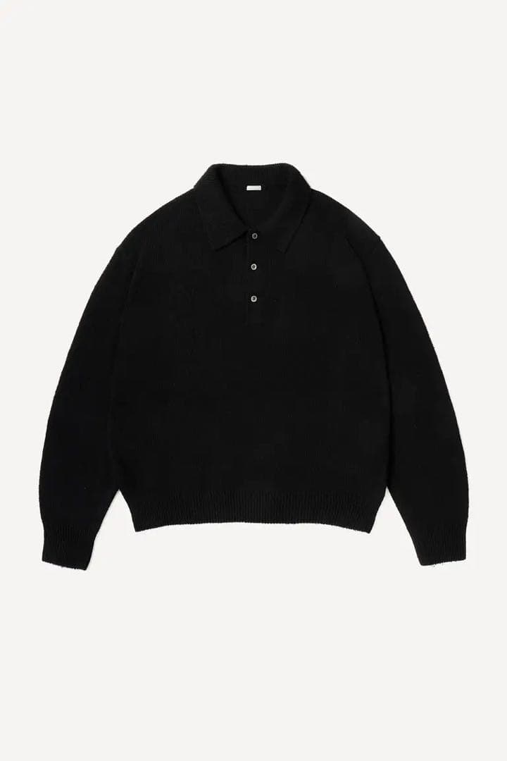 Black A.PRESSE washed silk nep polo shirt laid flat showing collar and three-button placket.
