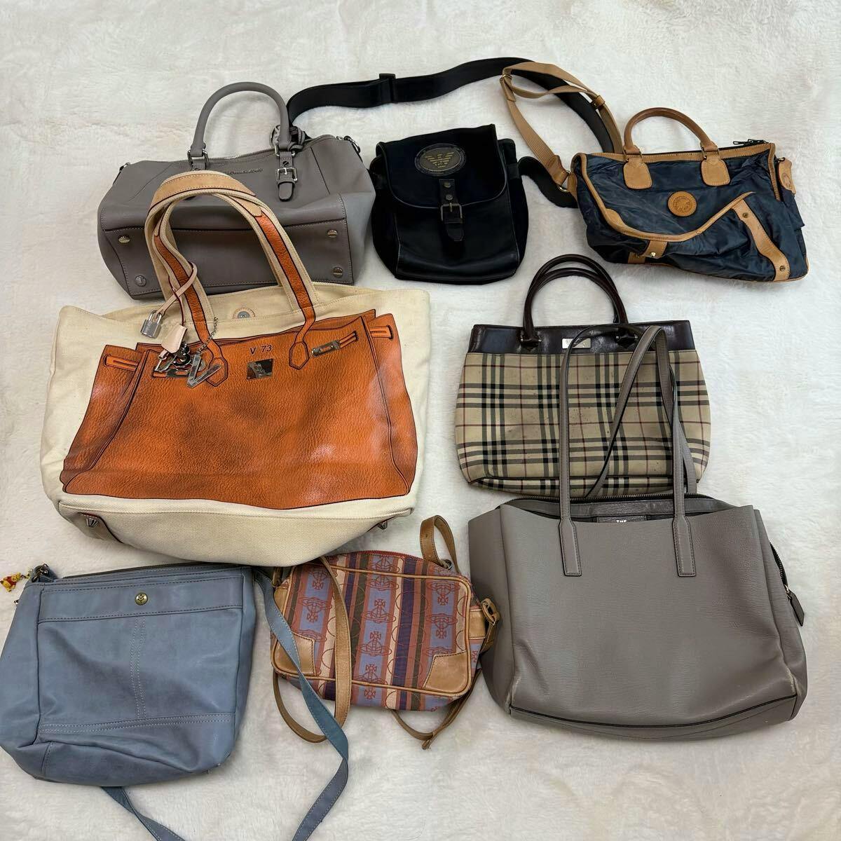A selection of various handbags and shoulder bags arranged on a white surface.