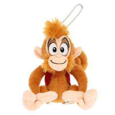 Brown Abu plush keychain sitting facing forward with a ball-chain attachment visible.
