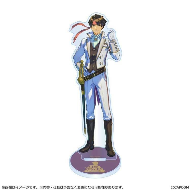 Acrylic stand of 亜双義 一真 showing full-body character artwork on a round purple base with a 25th anniversary logo.