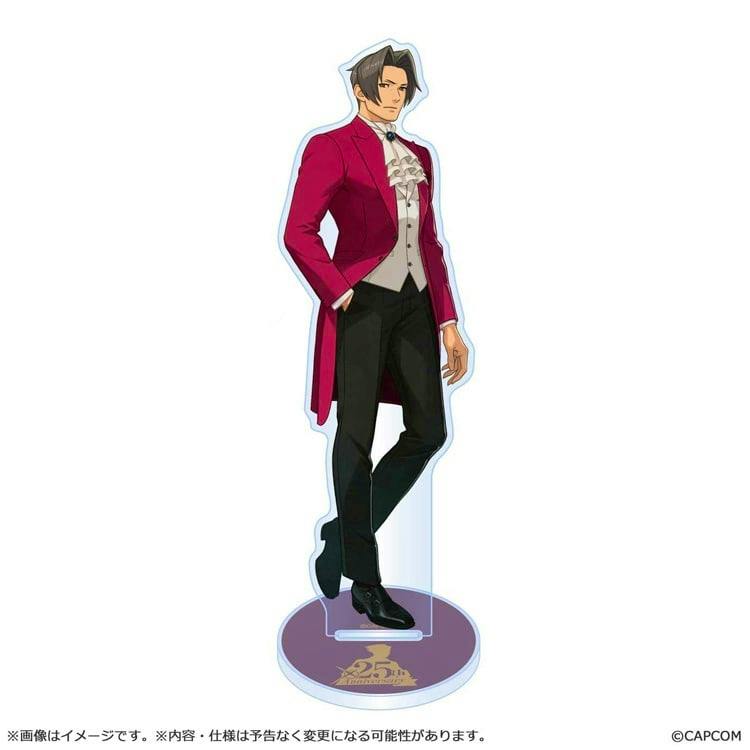 A full-length acrylic stand of 御剣 怜侍 wearing a magenta tailcoat, displayed on a round base with a 25th anniversary logo.