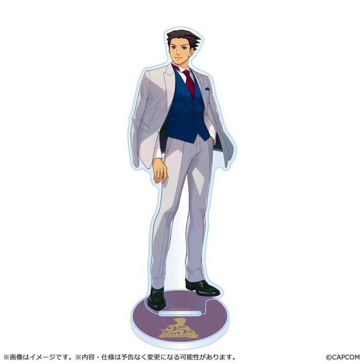 Acrylic stand of 成歩堂 龍一 (Phoenix Wright) in a white suit with a blue vest standing on a round purple base with a 25th anniversary logo.