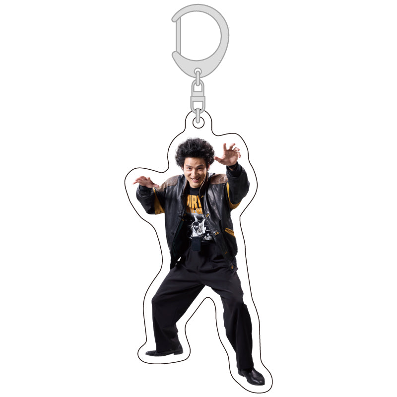 Acrylic keychain featuring a full-body photo of a person wearing a jacket and pants attached to a metal clasp.