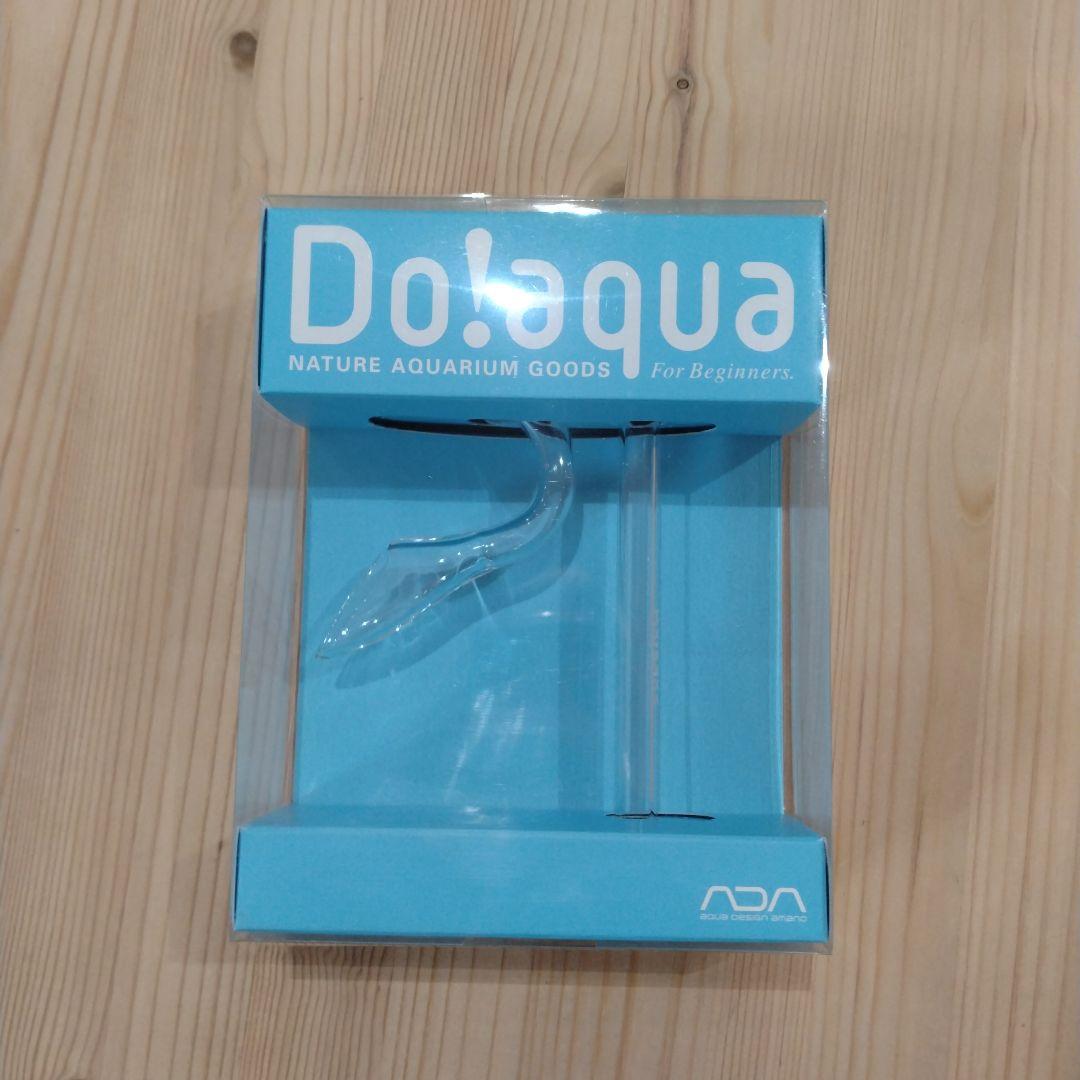 Glass aquarium intake pipe visible inside blue Do!aqua product packaging.