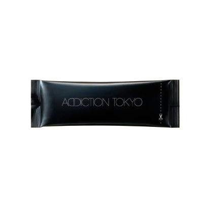 A black refill pouch for the face powder with "ADDICTION TOKYO" printed on the front.