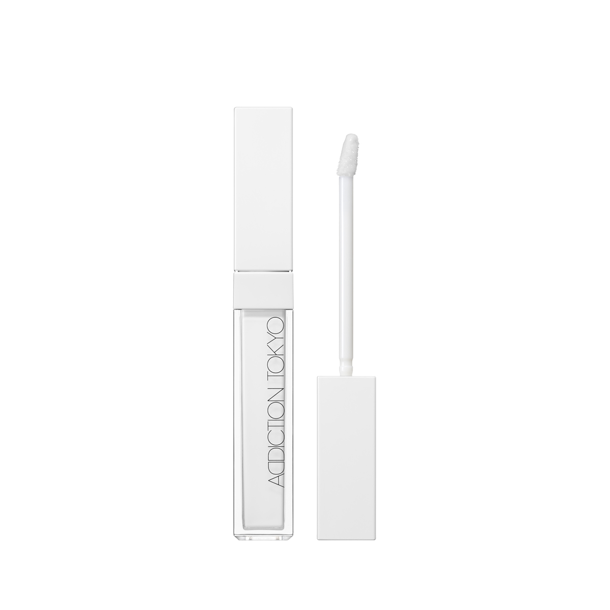 A clear ADDICTION TOKYO lip serum tube with a white rectangular cap and the applicator wand shown beside it.