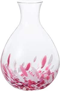 Clear glass sake pitcher with a bulbous body and pink sakura-like petal pattern concentrated near the base.