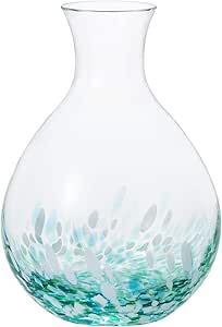 Clear glass sake pitcher (tokuri) with a rounded body, narrow neck, and green-and-white mottled pattern at the base.