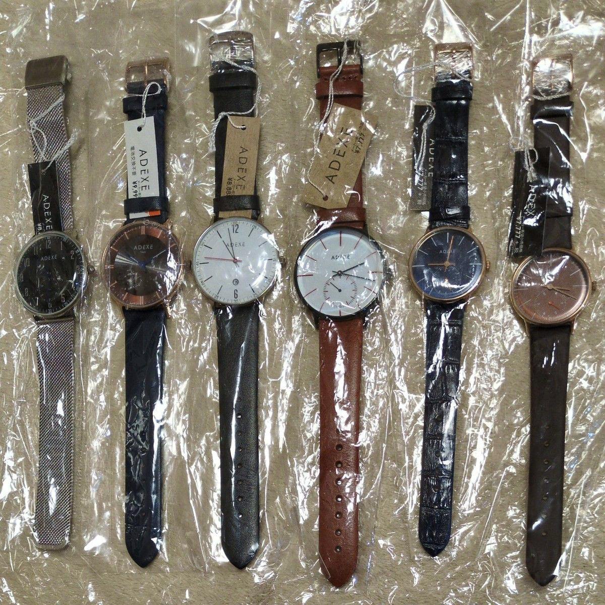 Six ADEXE wristwatches with various leather and mesh bands shown side by side in plastic packaging.