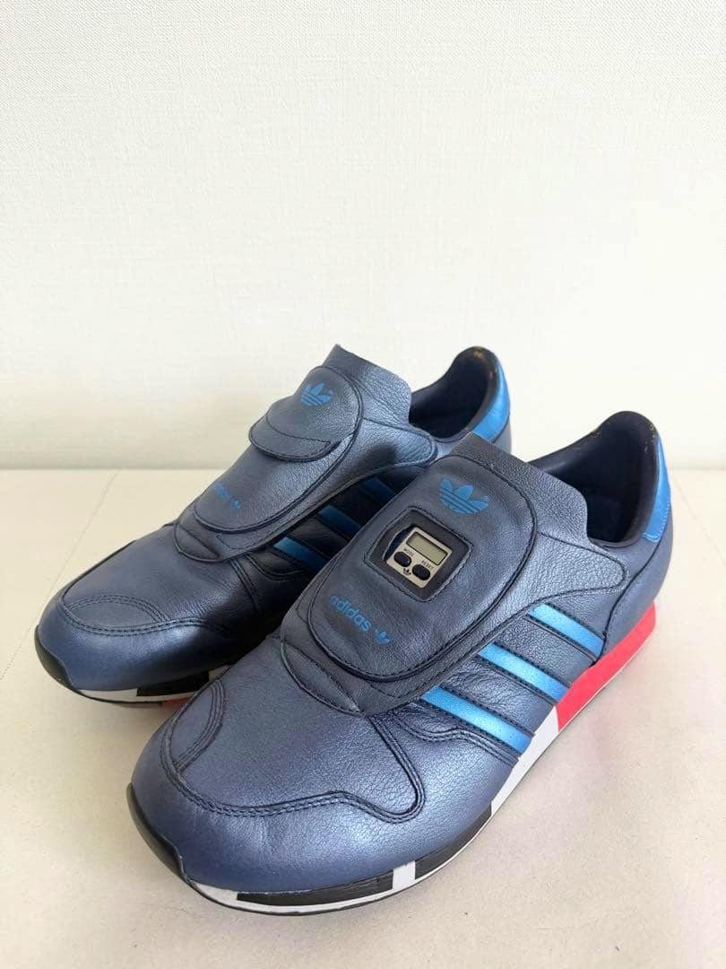 Angled front view of a pair of navy Adidas Originals マイクロペーサー3 (Micro Pacer 3) sneakers (28cm) placed on a light surface.