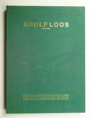 Front cover of a green hardcover book showing gold text "ADOLF LOOS 1870-1933".