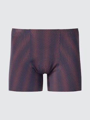 Front view of men's seamless boxer briefs with an all-over geometric triangle pattern.