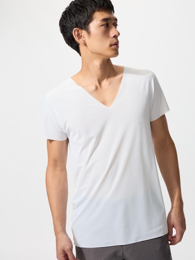 Male model wearing a white V-neck T-shirt.