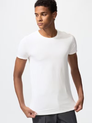 Male model wearing a white men's crew-neck polyester T-shirt.