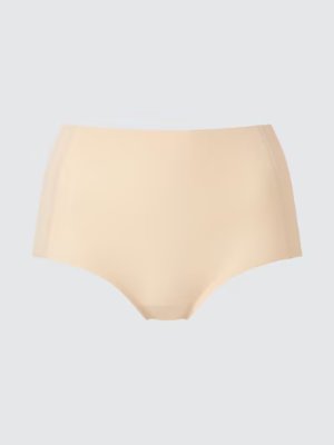Front view of the women's seamless just-waist shorts underwear in beige on a plain background.