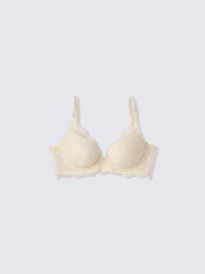 A strap, non-wired airy seamless bra laid flat on a light background.