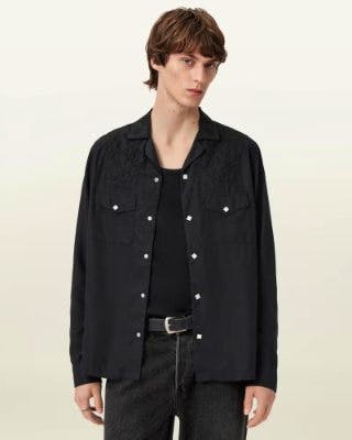 Male model wearing a black AKAN LS long-sleeve shirt shown from the front.