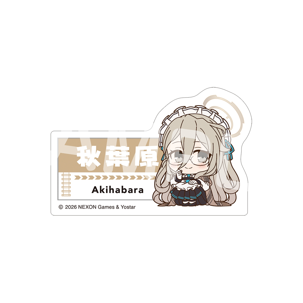 A paper sticker showing an illustrated character with the text "Akihabara" and Japanese characters.